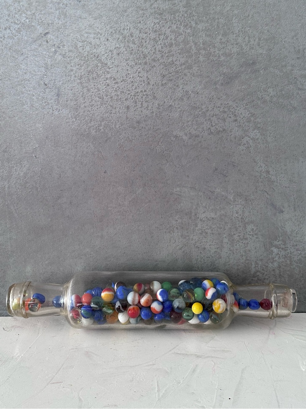 VINTAGE ROLLING PIN FILLED WITH MARBLES